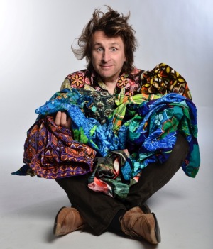 Milton Jones Cross legged.jpeg